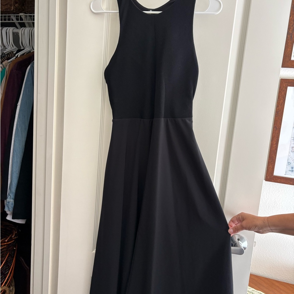 Athlete halter dress with ribbed detail.